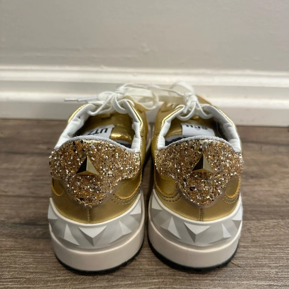 SCHUTZ ST-BOLD LEATHER SNEAKER in GOLD